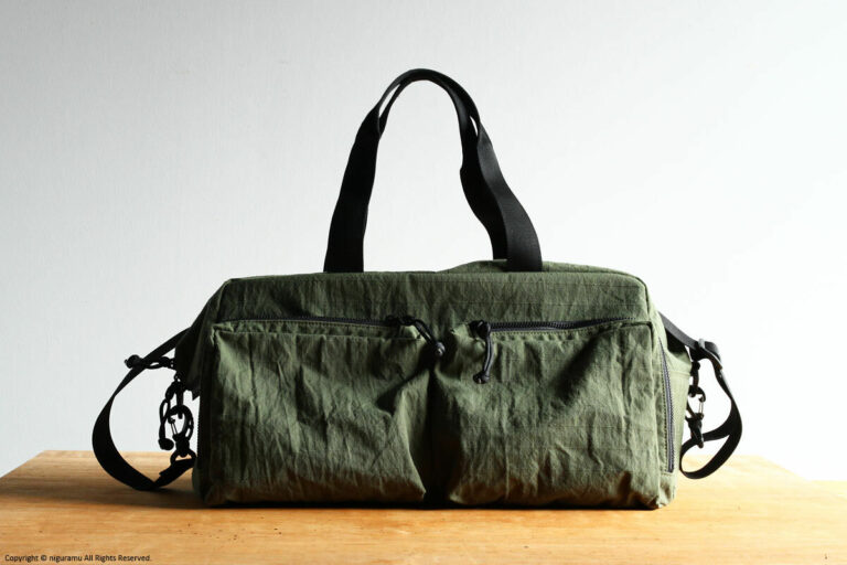 Kidney Trabeling bag / カーキ